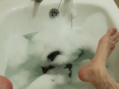 Draining in the Tub in Bathing Suit