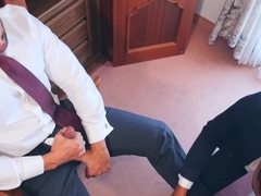 Clothed men fuck in a hotel room until the sperm begins to flow on their lips