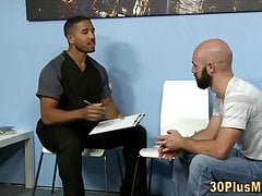 Muscled black doctor gets cock tugged for cum