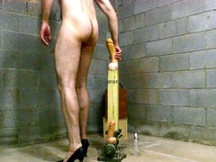 Jon Scarecrow having a blast with a massive dildo in high heels