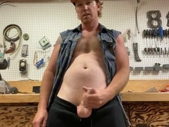 Redhead construction worker jerks off alone in workshop