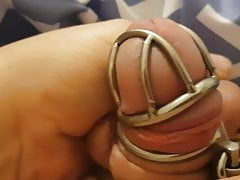 Chastity ball squeezing