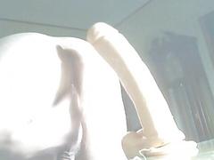 He takes his time sliding up and down this faux dick