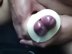 Buddies using a cock sleeve together with nice cumshots