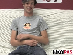 Adorable gay guy Danny jerks off his dick on couch solo