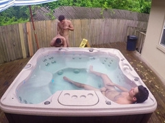 Outdoor fun in the jacuzzi for Tim Hanes and Valentino