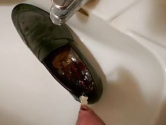 Piss in men's dress shoe