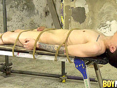 Wrapped up youngster gets his nice face pounded by huge dick