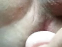 Molly in car dildoing her ass