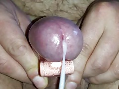 Close up cumshots with two toys