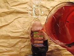 cock bathed in hot wax