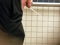 College guy taking a piss!