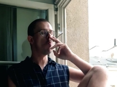 DISPLAYING OFF MY FIRM HARD-ON WHILE SMOKING IN THE WINDOW
