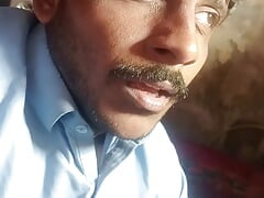 Handsome man showing his  face to his fan's.