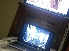 Shooting a load watching porn