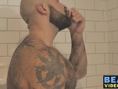 Bear washes his furry body and spanks his thick monkey