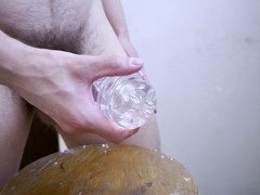 Hunky guy drills his Fleshlight toy and shoots his load