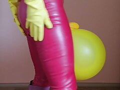 Rubberboy masturbates small dick and balls are in a balloon