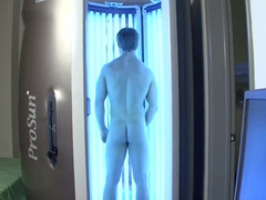 Tanning Hunk Jerks Off