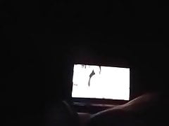 Stroking cock while watchin porn