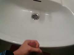 Cumming over the sink