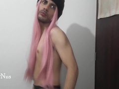 Pinkish periwig on guy with dance