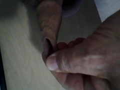 A quick load from my uncut cock.