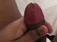 Playing with my uncut cock while cross-dressed