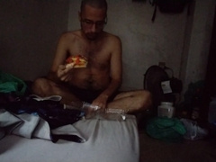 gainer gobbling a large slip of pizza