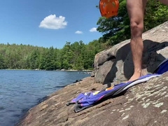 Canadian dude sunbathes in his swim trunks before bare snorkelling!