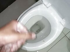 Masturbating
