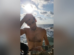 Klaus Joe Naked Next To A Restless Sea