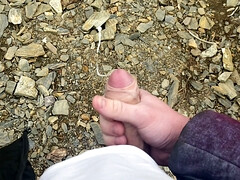 I jerk off a flaccid dick and cum on a mountain lake in nature! POV!