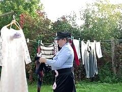 In police uniform to pick up laundry