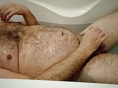 Guy masturbating and pissing on himself