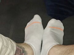 old worn white stockings ( male feet)