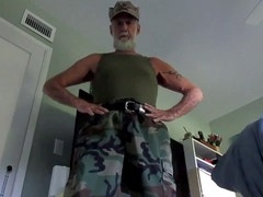 Hairy military man gets off solo in a uniformed session