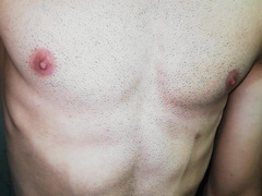 young stud toying with his bumpers, and marked tummy