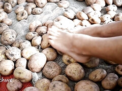 Touching delicious potatoes with the feet