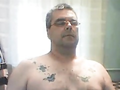 Beefy guy stroking hard